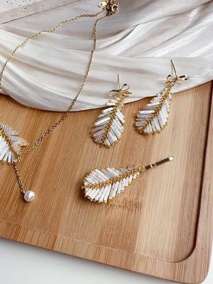 Starrybead | Golden Feathered Bead Earrings for Women