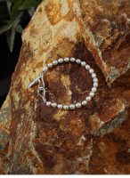 Luminous Purity: 5A Aurora Freshwater Pearl & Sterling Silver Healing Bracelet
