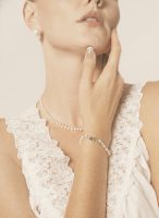 Luminous Purity: 5A Aurora Freshwater Pearl & Sterling Silver Healing Bracelet