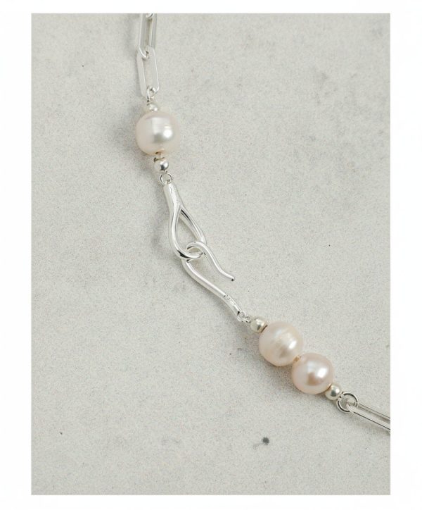 Luminous Flow: Freshwater Pearl & Sterling Silver Long Station Necklace