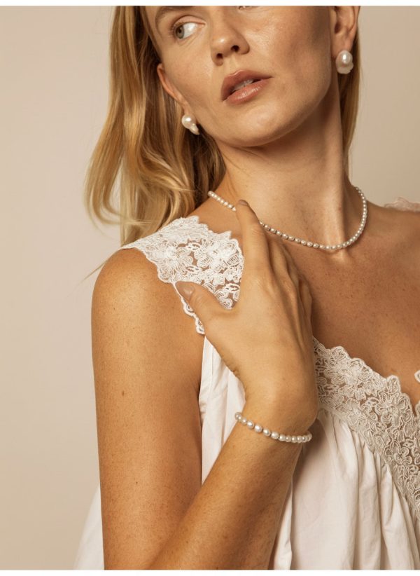 Luminous Purity: 5A Aurora Freshwater Pearl & Sterling Silver Healing Bracelet