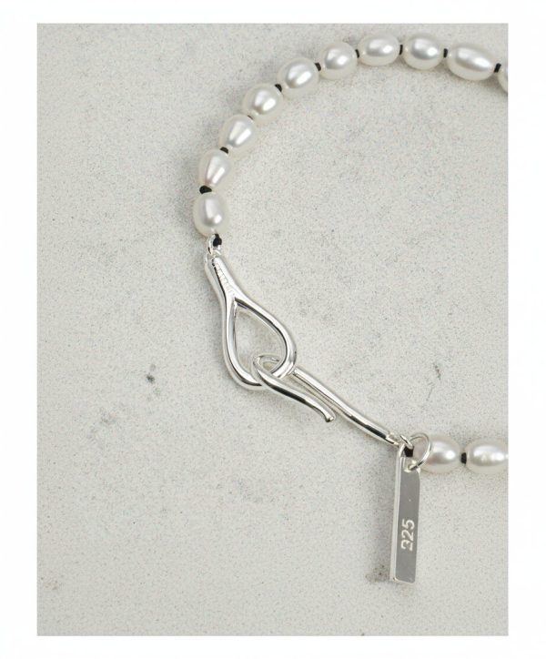 Luminous Purity: 5A Aurora Freshwater Pearl & Sterling Silver Healing Bracelet