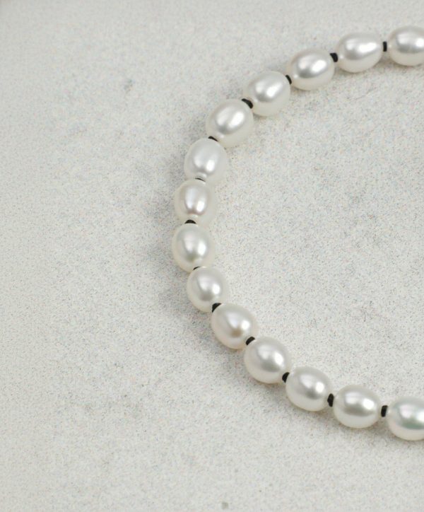 Luminous Purity: 5A Aurora Freshwater Pearl & Sterling Silver Healing Bracelet