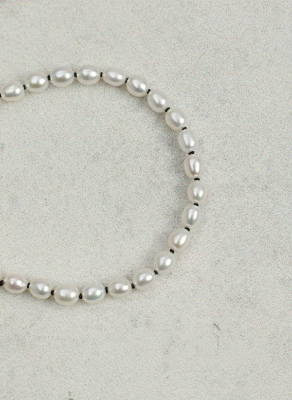 Luminous Purity: 5A Aurora Freshwater Pearl & Sterling Silver Healing Bracelet