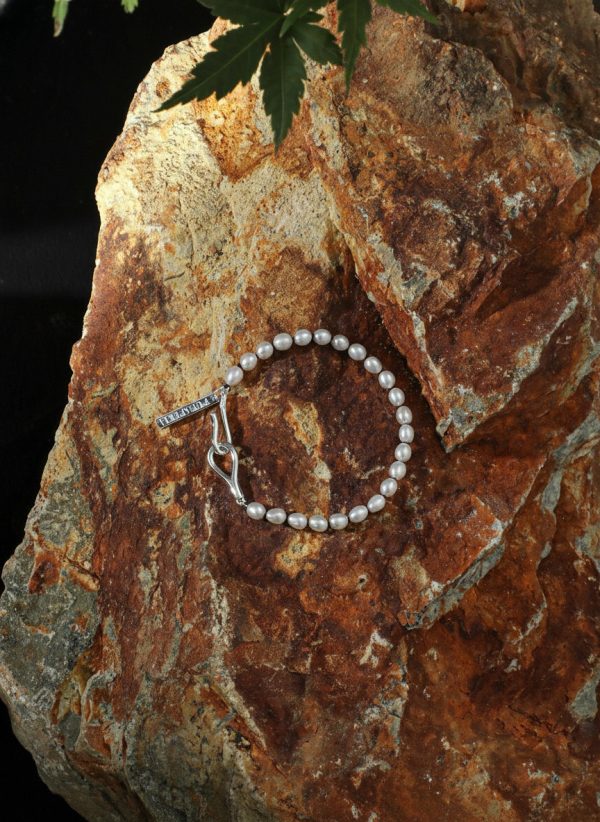 Luminous Purity: 5A Aurora Freshwater Pearl & Sterling Silver Healing Bracelet