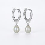 Luminous Serenity: 925 Sterling Silver & Natural Pearl Huggie Earrings