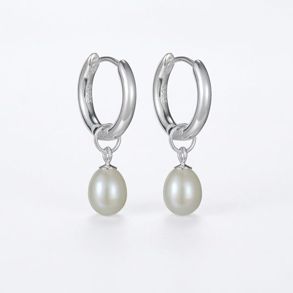 Luminous Serenity: 925 Sterling Silver & Natural Pearl Huggie Earrings