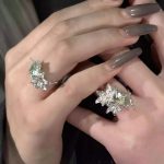 Ethereal Renewal: Sterling Silver & Peridot 'Lily in the Rainy Night' Adjustable Rings