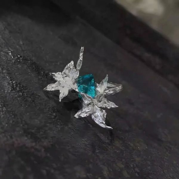 Noble Integrity: Sterling Silver & Imperial Teal Crystal Gladiolus Ring