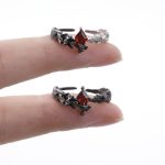 Eternal Paradox: Sterling Silver Dove & Raven Feather Garnet Couple Rings