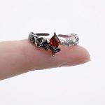 Eternal Paradox: Sterling Silver Dove & Raven Feather Garnet Couple Rings