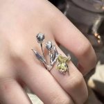 Unconventional Romance: Sculpted Silver Tulip & Radiant Yellow Zircon ISFP Ring