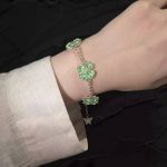 Lucky Radiance: Sterling Silver & Green Crystal Four-Leaf Clover Adjustable Bracelet