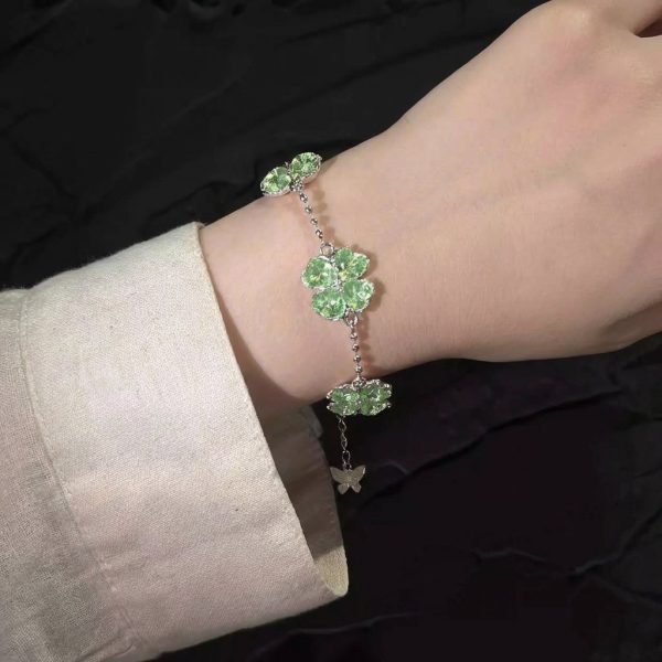 Lucky Radiance: Sterling Silver & Green Crystal Four-Leaf Clover Adjustable Bracelet