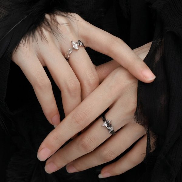 Eternal Paradox: Sterling Silver Dove & Raven Feather Garnet Couple Rings
