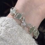 Ethereal Serenity: Sterling Silver & Green Crystal Butterfly Bracelet