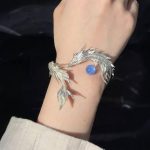 Ethereal Guardian: Sterling Silver & Blue Moonstone Wandering Dragon Cuff