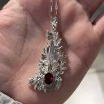 Melodic Passion: Natural Red Garnet & Sterling Silver Violin Pendant Necklace