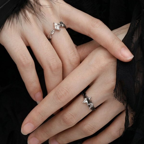 Eternal Paradox: Sterling Silver Dove & Raven Feather Garnet Couple Rings