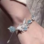 Tranquil Flow: Natural Aquamarine & Sterling Silver "Swimming Fish" Healing Bracelet