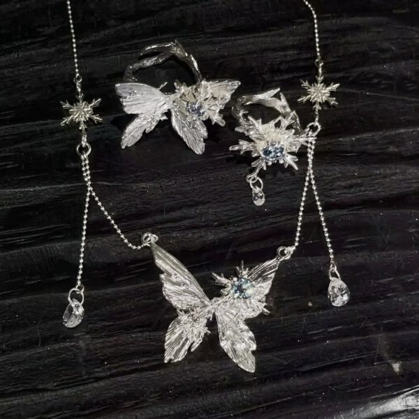 Ethereal Transformation: Winter Butterfly & Snowflake Zircon Adjustable Ring