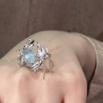 Celestial Fluidity: Raw Aquamarine & Sterling Silver Pisces Concept Ring