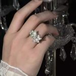 Ethereal Renewal: Sterling Silver & Peridot 'Lily in the Rainy Night' Adjustable Rings