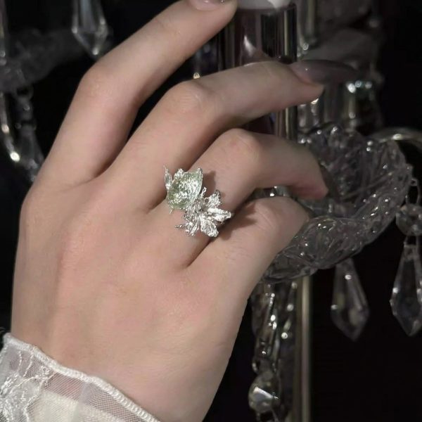 Ethereal Renewal: Sterling Silver & Peridot 'Lily in the Rainy Night' Adjustable Rings