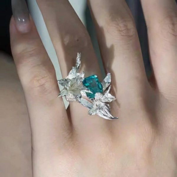 Noble Integrity: Sterling Silver & Imperial Teal Crystal Gladiolus Ring