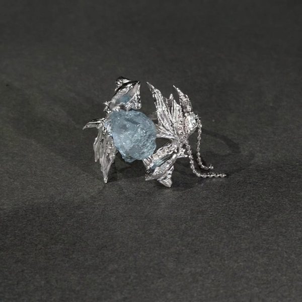 Celestial Fluidity: Raw Aquamarine & Sterling Silver Pisces Concept Ring