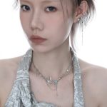 Ethereal Fluidity: Sterling Silver & Zircon Fishtail Tassel Ear Cuff