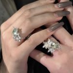 Ethereal Renewal: Sterling Silver & Peridot 'Lily in the Rainy Night' Adjustable Rings