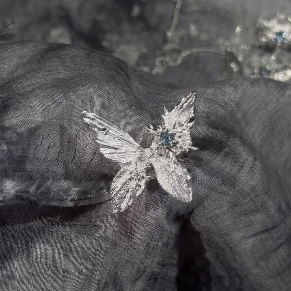 Ethereal Transformation: Winter Butterfly & Snowflake Zircon Adjustable Ring