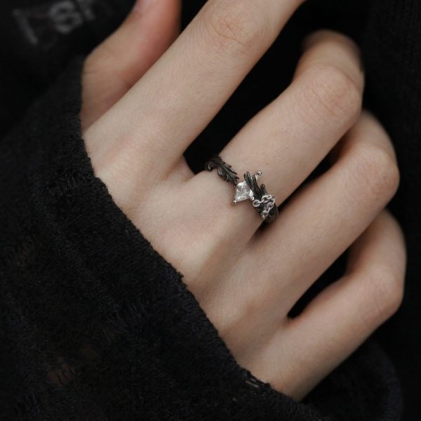 Eternal Paradox: Sterling Silver Dove & Raven Feather Garnet Couple Rings