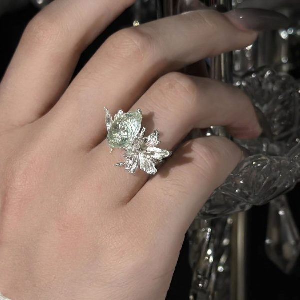 Ethereal Renewal: Sterling Silver & Peridot 'Lily in the Rainy Night' Adjustable Rings