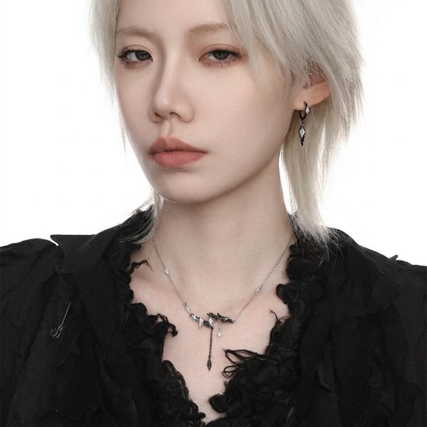 Mystic Protection: Gothic Feather & Garnet-Red Zirconia Huggie Earrings