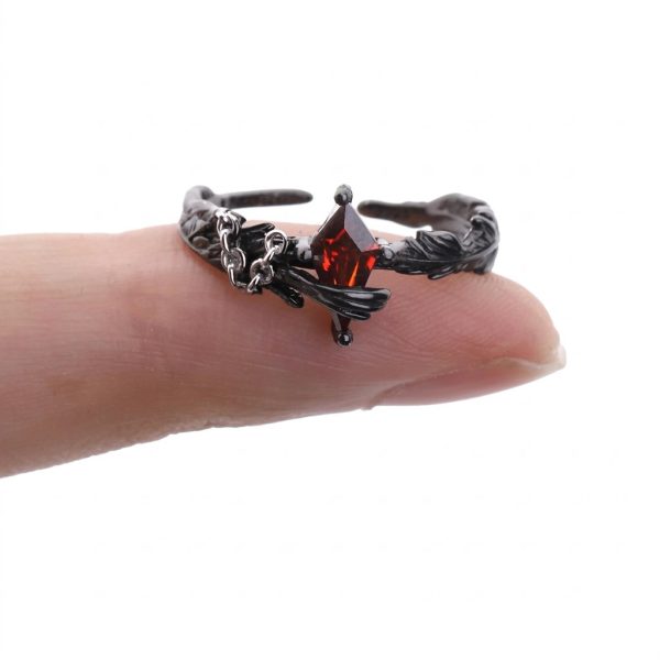 Eternal Paradox: Sterling Silver Dove & Raven Feather Garnet Couple Rings